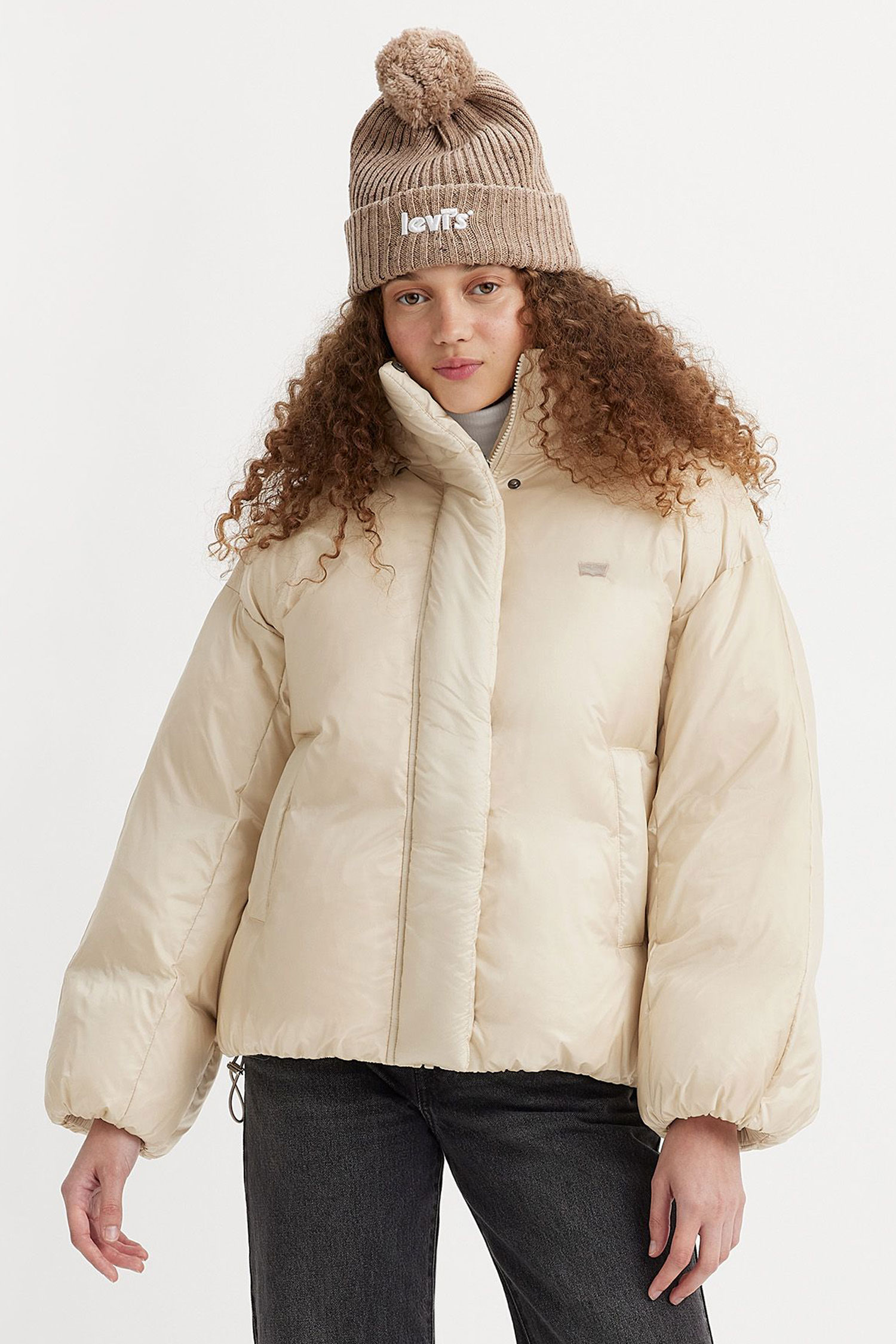 Женский бежевый пуховик 1