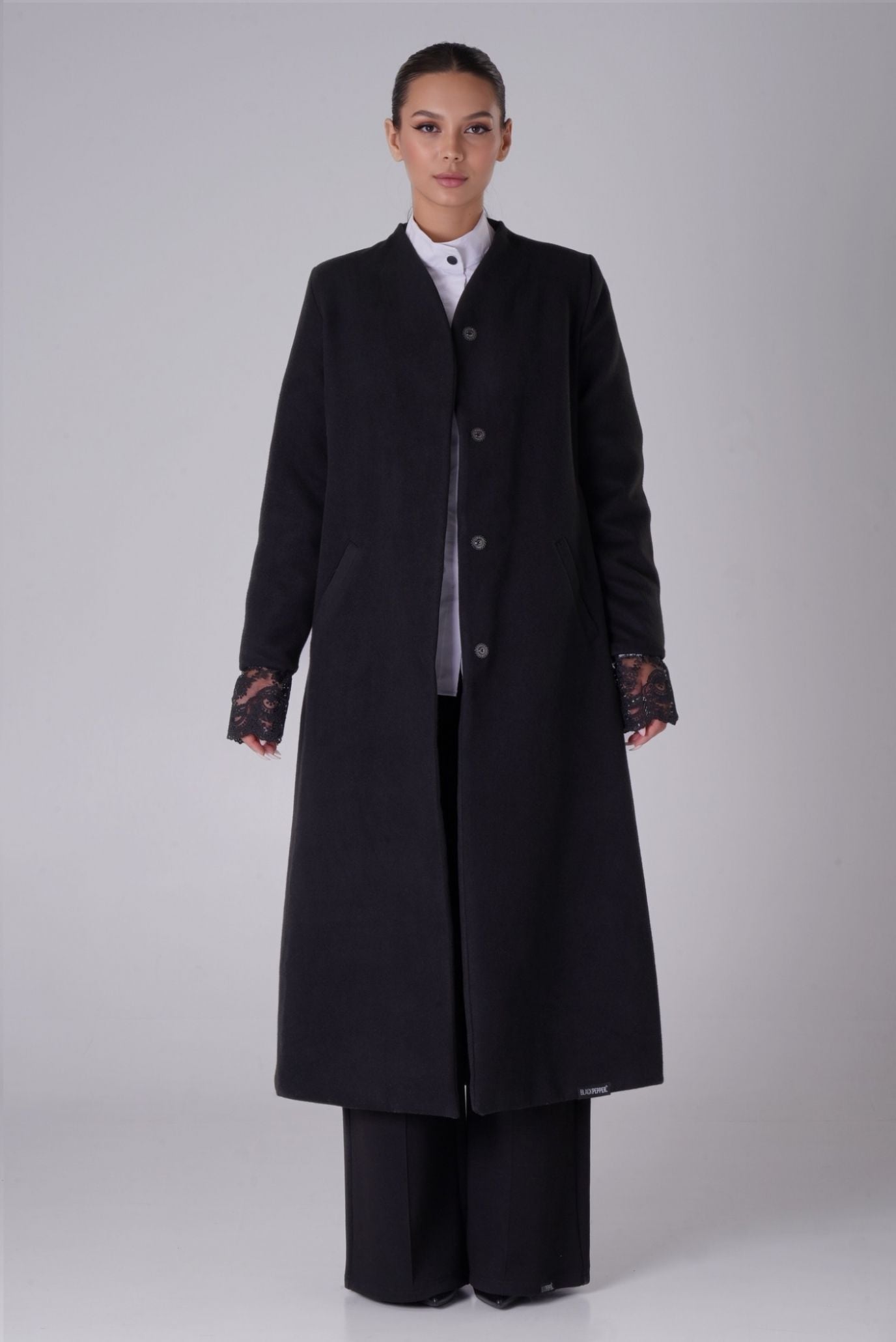 Женское черное теплое пальто 2