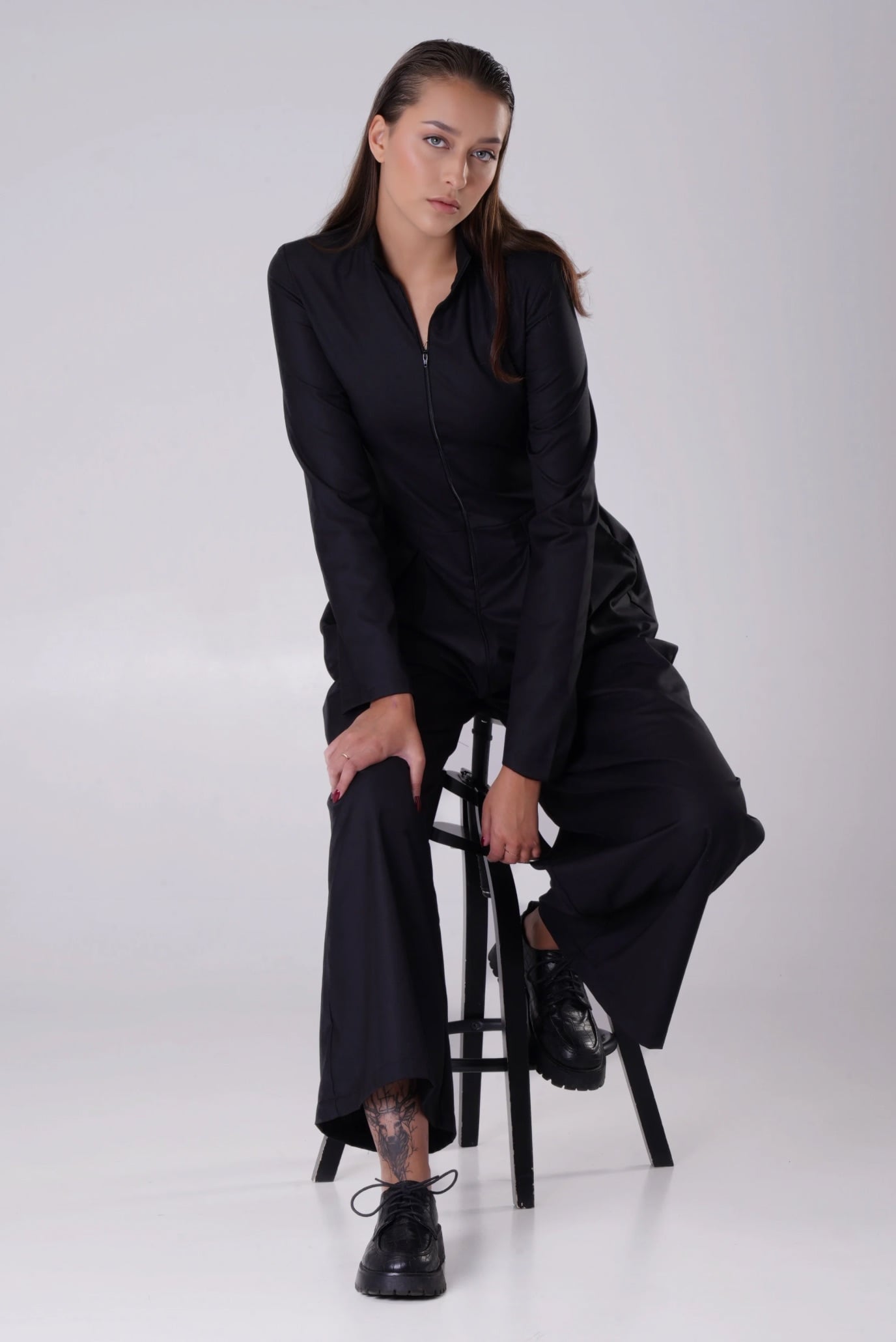 Женский черный комбинезон 1