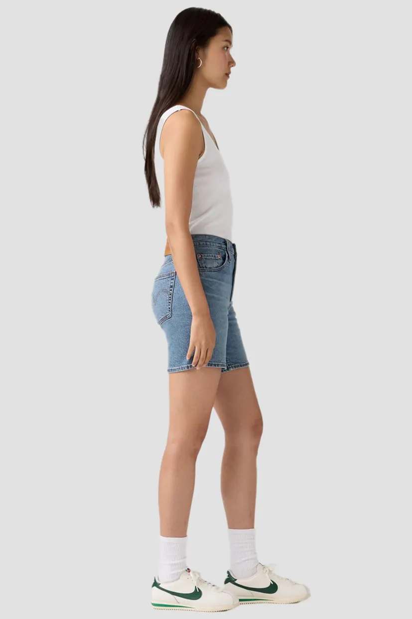 Женские голубые джинсовые шорты 501® Mid Thigh 4